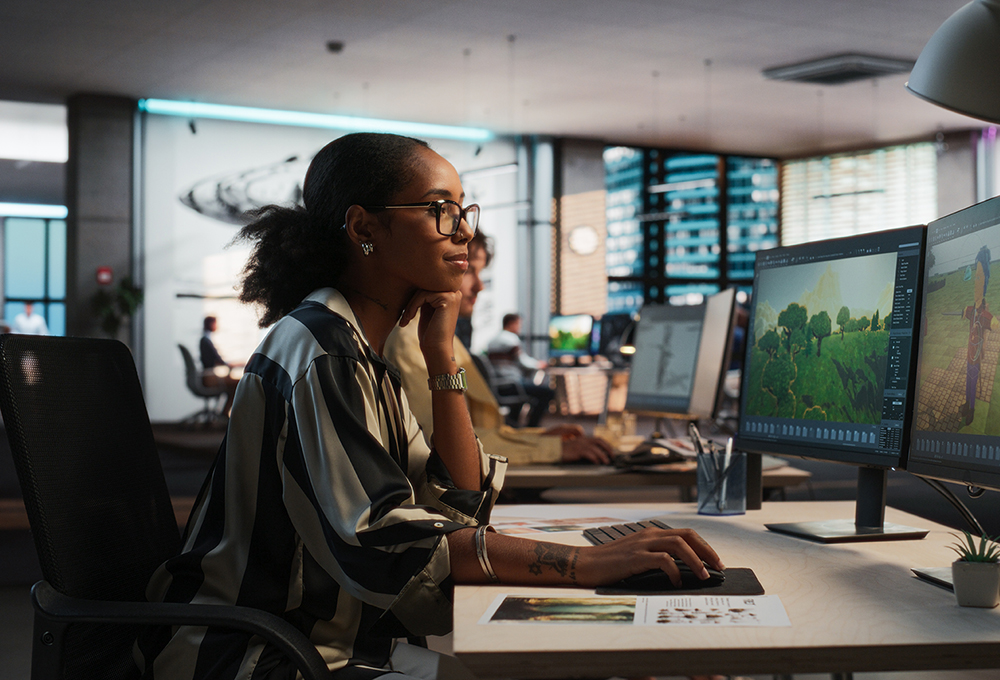 Female,Black,Game,Developer,Using,Desktop,Computer,,Designing,Unique,World